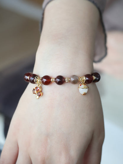 *Instocks* - Crimson Blessing - 8mm Fire Quartz, Garnet, Black Gold Skeletal Sunstone, 招财猫 Cat Charm, Red 3-Leaf Clover & 福 Charm (Elastic) Gold